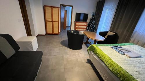 Una cama o camas en una habitación de Willa Larysa Agro