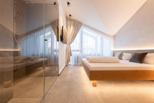 Posteľ alebo postele v izbe v ubytovaní Max Mountain Apartments