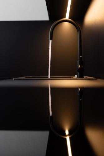 a close up of a bathroom sink with a faucet at Max Mountain Apartments in Neustift im Stubaital