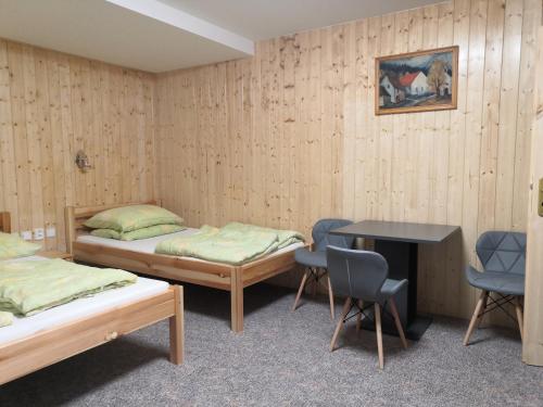 Postel nebo postele na pokoji v ubytování Apartmán ŠUMAVA