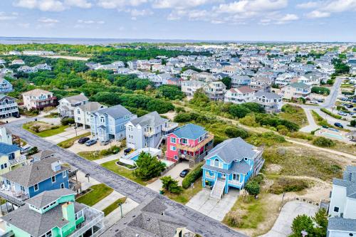 an aerial view of a residential neighborhood with houses at Shared Dreams OS23 in Corolla