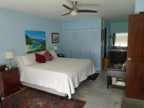 Ένα ή περισσότερα κρεβάτια σε δωμάτιο στο Villa Marina Porto Ixtapa