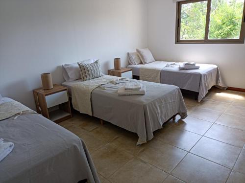 Tempat tidur dalam kamar di Solar de Roca