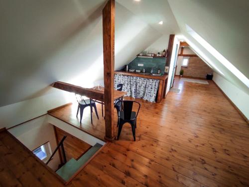 an overhead view of a room with a table and chairs at Pelini - 1 in Szentendre