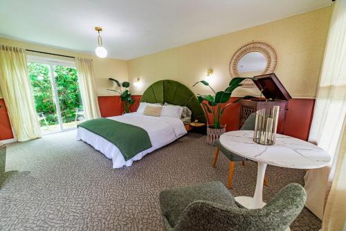 Ένα ή περισσότερα κρεβάτια σε δωμάτιο στο The Springs Motel