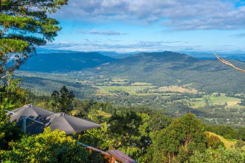 a view from the top of a mountain with an umbrella at The Polish Place in Mount Tamborine