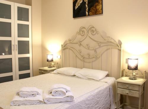 Cama ou camas em um quarto em SEVITUR Seville Comfort Apartments