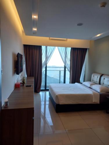 Katil atau katil-katil dalam bilik di TopSuites at Ion-Delemen Genting Highlands