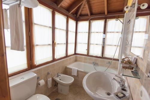Ванна кімната в Casa do Merlo