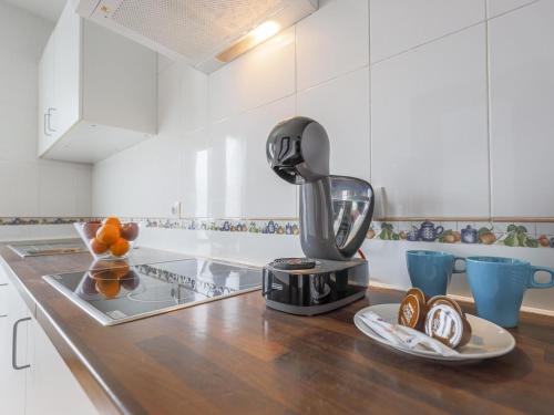 Kuchyň nebo kuchyňský kout v ubytování Alcalá del rio! 2 a