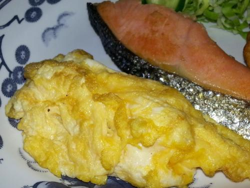 a piece of food on a plate with a piece of food at Minshuku Myojoso in Yoron
