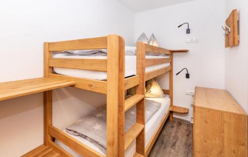
Ein Etagenbett oder Etagenbetten in einem Zimmer der Unterkunft Elto Appartements Chalet
