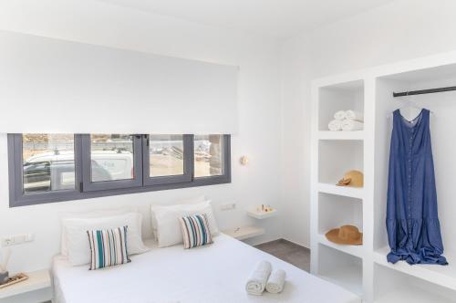 Rúm í herbergi á Bamboo Villa Naxos