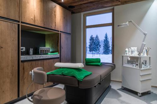 Fotografie z fotogalerie ubytování Relais & Châteaux Gut Steinbach Hotel Chalets SPA v destinaci Reit im Winkl