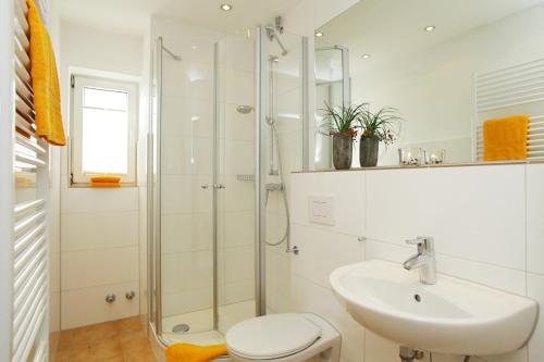 Et badeværelse på Ferienwohnung Mare Nostrum 9