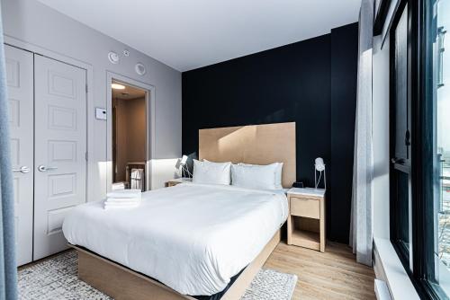 Katil atau katil-katil dalam bilik di WERFY Luxury Apart-Hotel