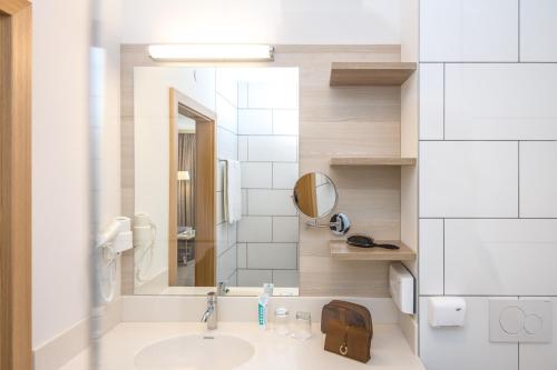 Koupelna v ubytování Hotel Das Himberg
