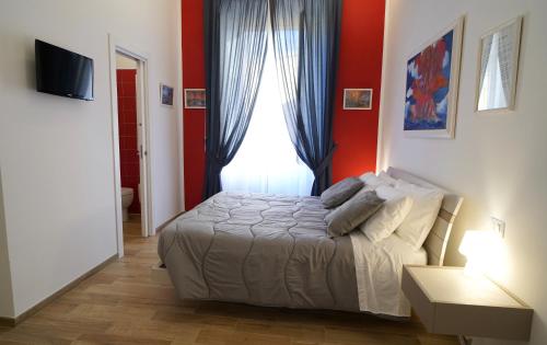 A bed or beds in a room at A Un Passo Da Tutto...