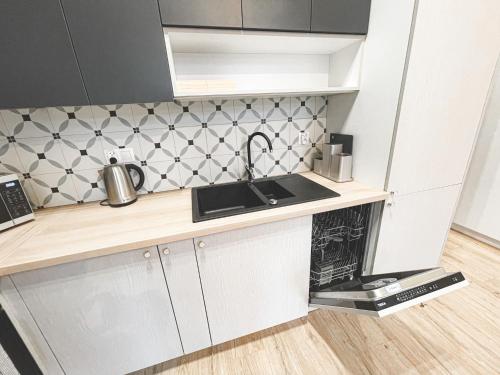 Foto Rent-Apart City Center Piotrkowska 5
