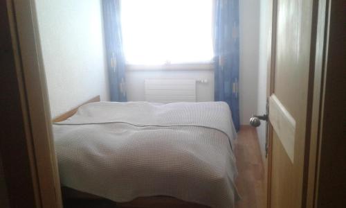 Postel nebo postele na pokoji v ubytování Central Small Apartment, Verbier