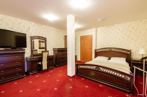 Postel nebo postele na pokoji v ubytování Orion Hotel Parczew