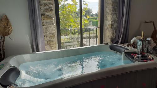 Půdorys ubytování Le Mas Romantique avec Jacuzzi et Sauna privé