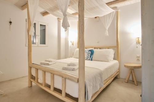 Ένα ή περισσότερα κρεβάτια σε δωμάτιο στο Cape Suites