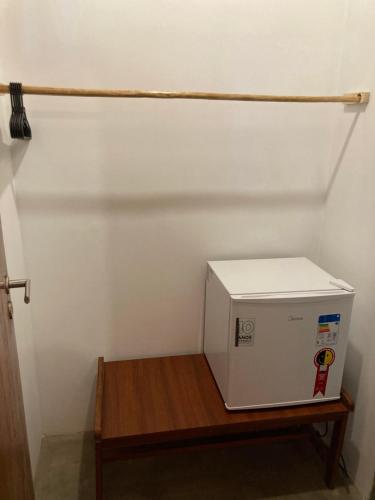 a white box sitting on a table in a room at Club Manguaba Beira Rio Mar in Japaratinga