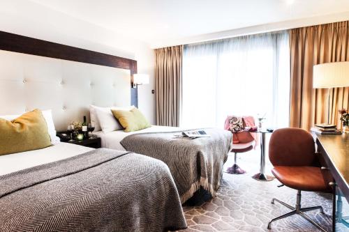Cama o camas de una habitación en The Address Connolly