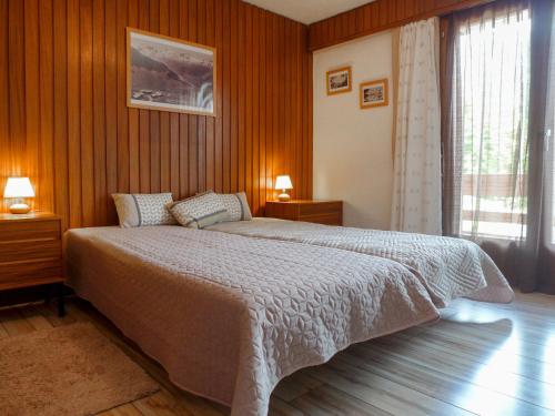 Postel nebo postele na pokoji v ubytování Apartment Val Neige 11 by Interhome