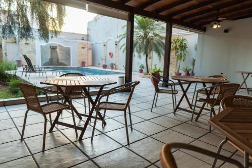 The swimming pool at or close to Hotel Embajador