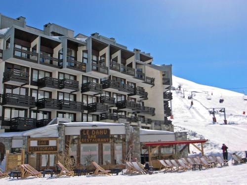 a hotel on the side of a snow covered mountain at Apartment Les Hauts du Val Claret - Val Claret-17 by Interhome in Tignes