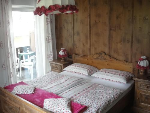 Letto o letti in una camera di Garni Toni