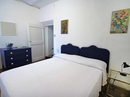 Säng eller sängar i ett rum på Apartment Bagnolo by Interhome