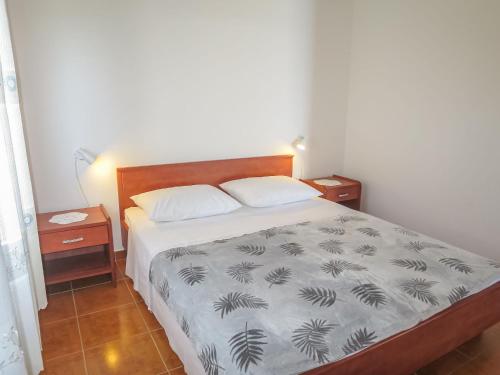 Postel nebo postele na pokoji v ubytování Holiday Home Bokolj - PSM154 by Interhome