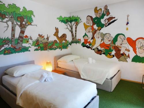 Postelja oz. postelje v sobi nastanitve Apartment Chesa Sonnalpine B 46 by Interhome