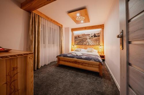 Posteľ alebo postele v izbe v ubytovaní Apartament Podwika