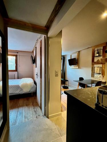 Postel nebo postele na pokoji v ubytování Grey Suite Val d'Isère