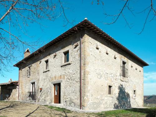 an old stone building with a roof at Holiday Home Pasqualino by Interhome in Bagnoregio