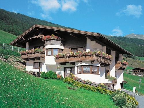 a house on a hill with flower boxes on it at Apartment Nadine-8 by Interhome in Sölden