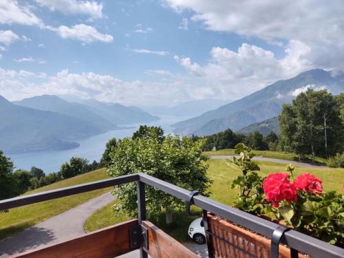 a balcony with a view of a lake and mountains at Apartment Cà Mia by Interhome in Dosso del Liro