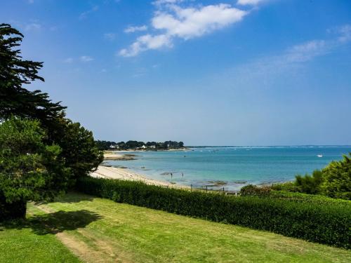 a view of a beach and the ocean at Holiday Home Maison Poul by Interhome in Saint-Pierre-Quiberon