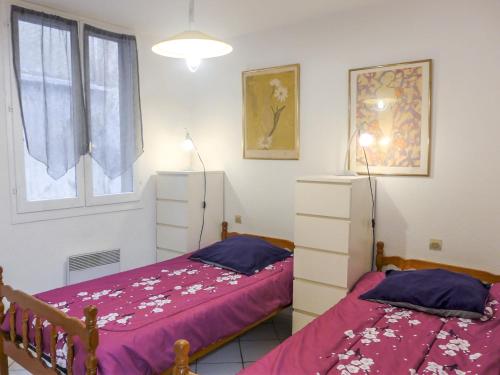 Ένα ή περισσότερα κρεβάτια σε δωμάτιο στο Apartment Vieux Nice by Interhome
