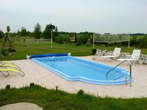 The swimming pool at or near Holiday Home Angelino