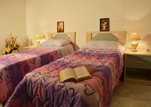 Cama o camas de una habitación en B&B La Collina