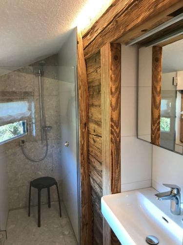 a bathroom with a sink and a shower at Chalet Feldkasten by Interhome in Dorf