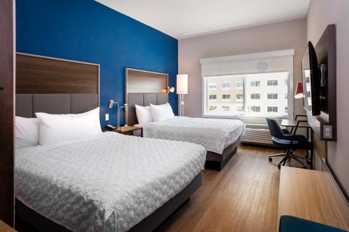Katil atau katil-katil dalam bilik di Tru by Hilton Pflugerville, TX
