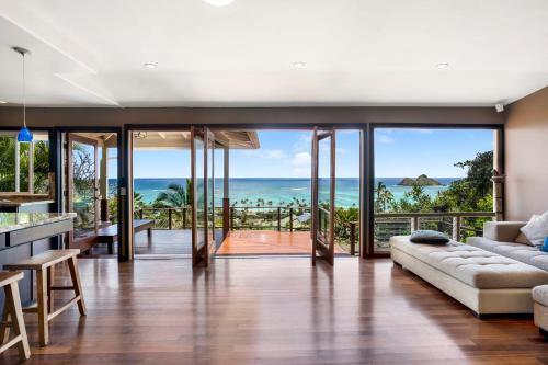 an open living room with a view of the ocean at A Place of Peace where heaven meets the Ocean in Kailua