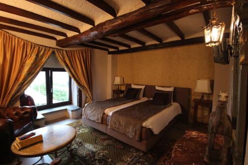 מיטה או מיטות בחדר ב-La Vie en Rose hotel