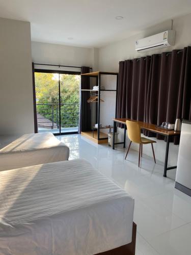 Ένα ή περισσότερα κρεβάτια σε δωμάτιο στο DD Modern House